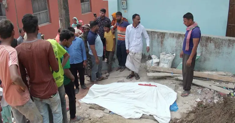 নিহত শ্রমিকের মরদেহ